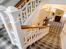 The grand central staircase provides access to principal first floor accommodation